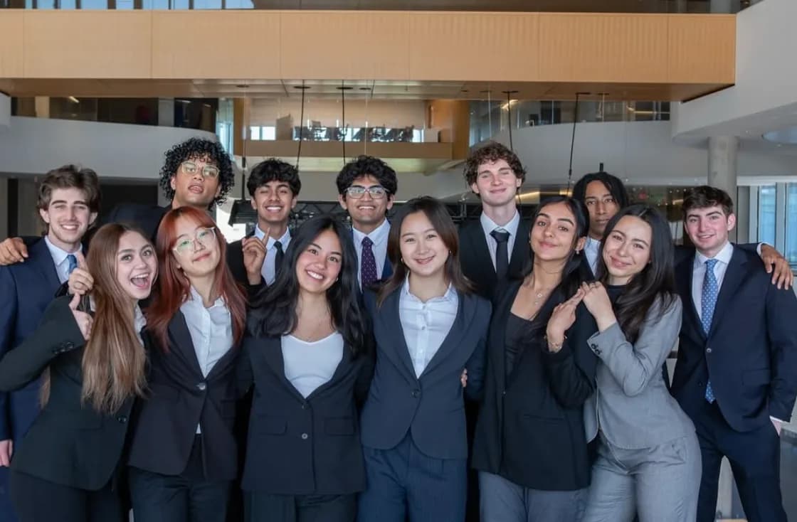 Brothers in business attire at the Global Hub