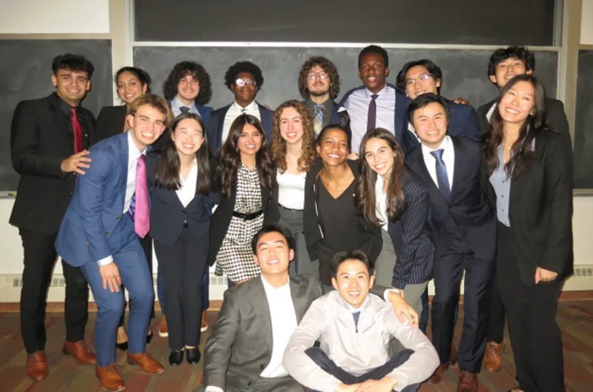 Brothers in business attire at chapter